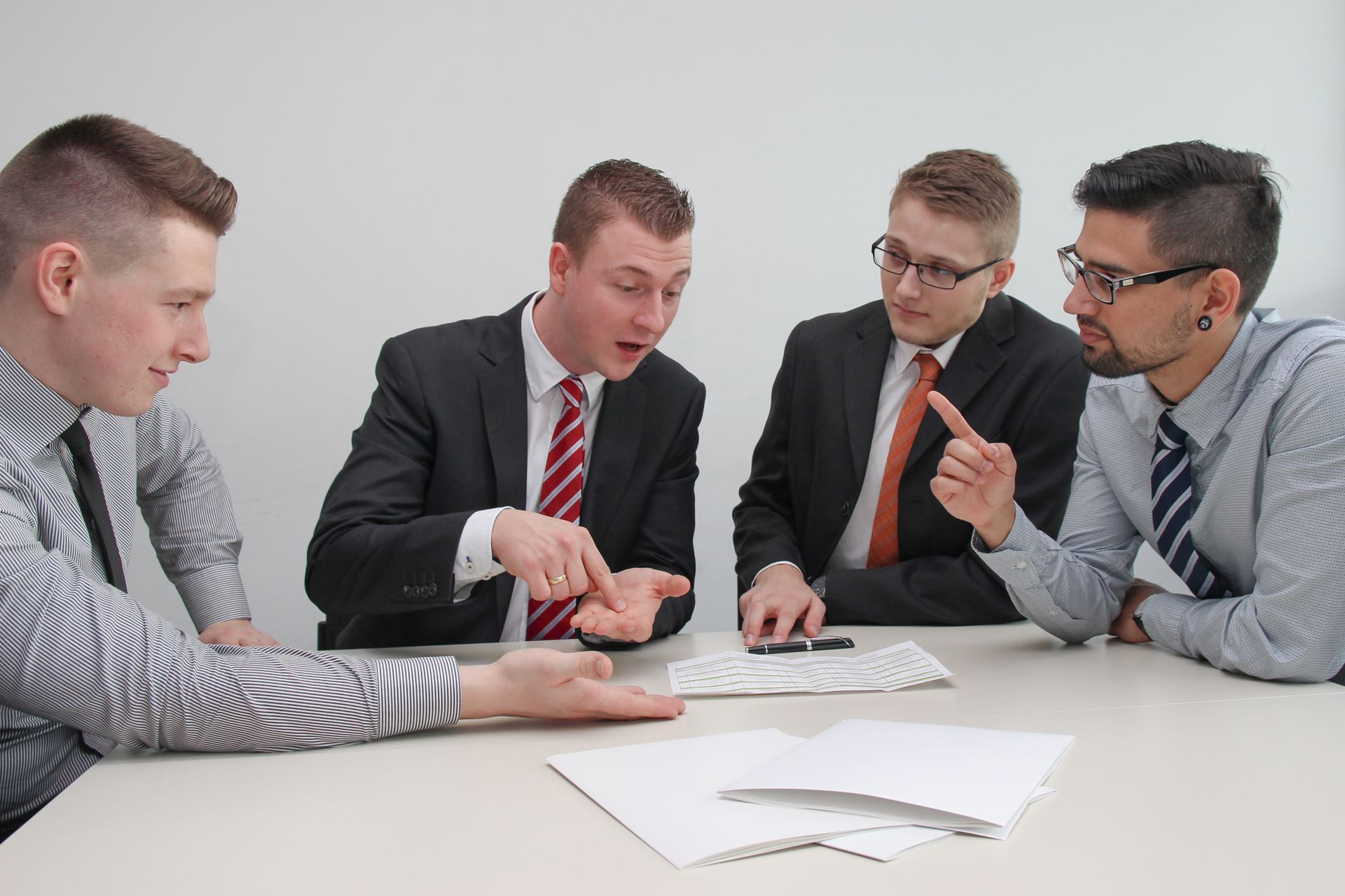 a group of people sitting at a table